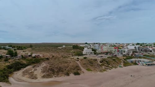 Flying over a Coastal Town In Argentina