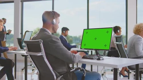 Handsome man working on computer