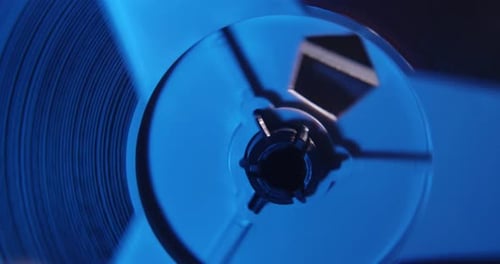 Film Reel Playing Movie And The Rewinding