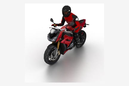 Vista previa: Motocicleta deportiva con figura de motero